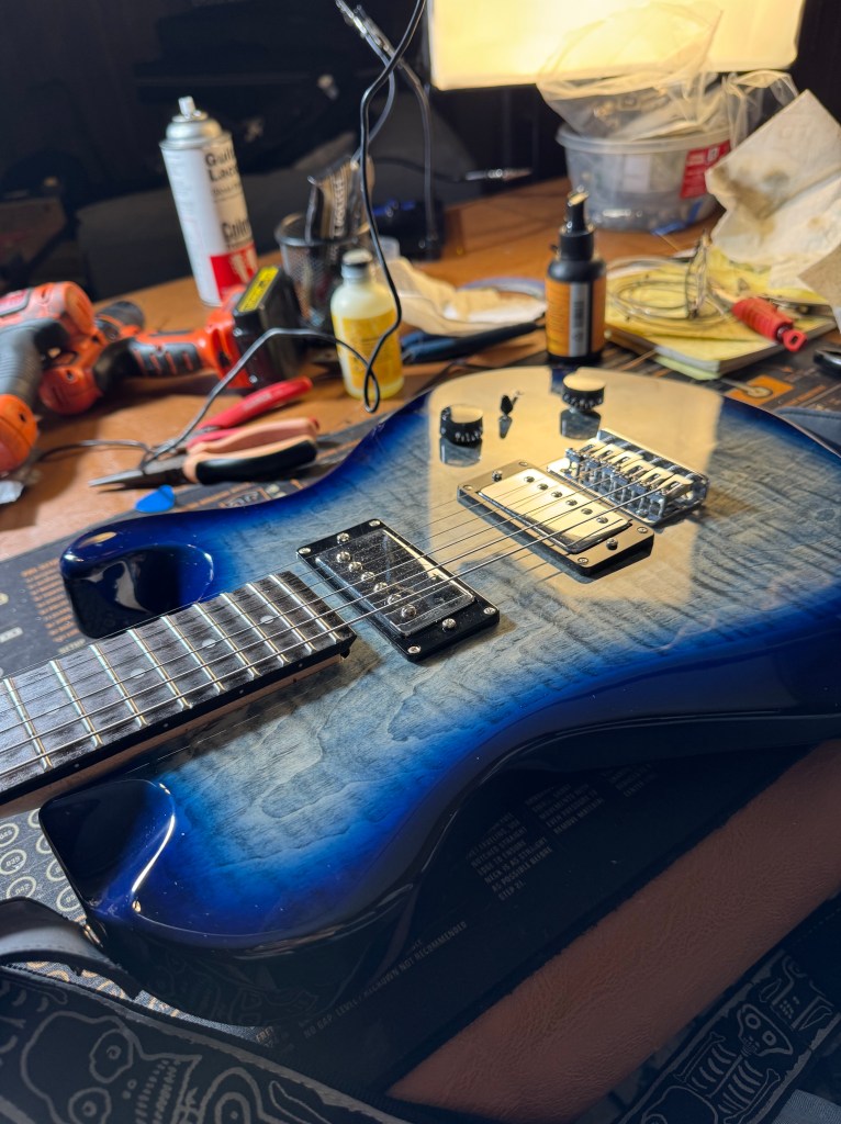PRS electric guitar setup and strings demonstration.
